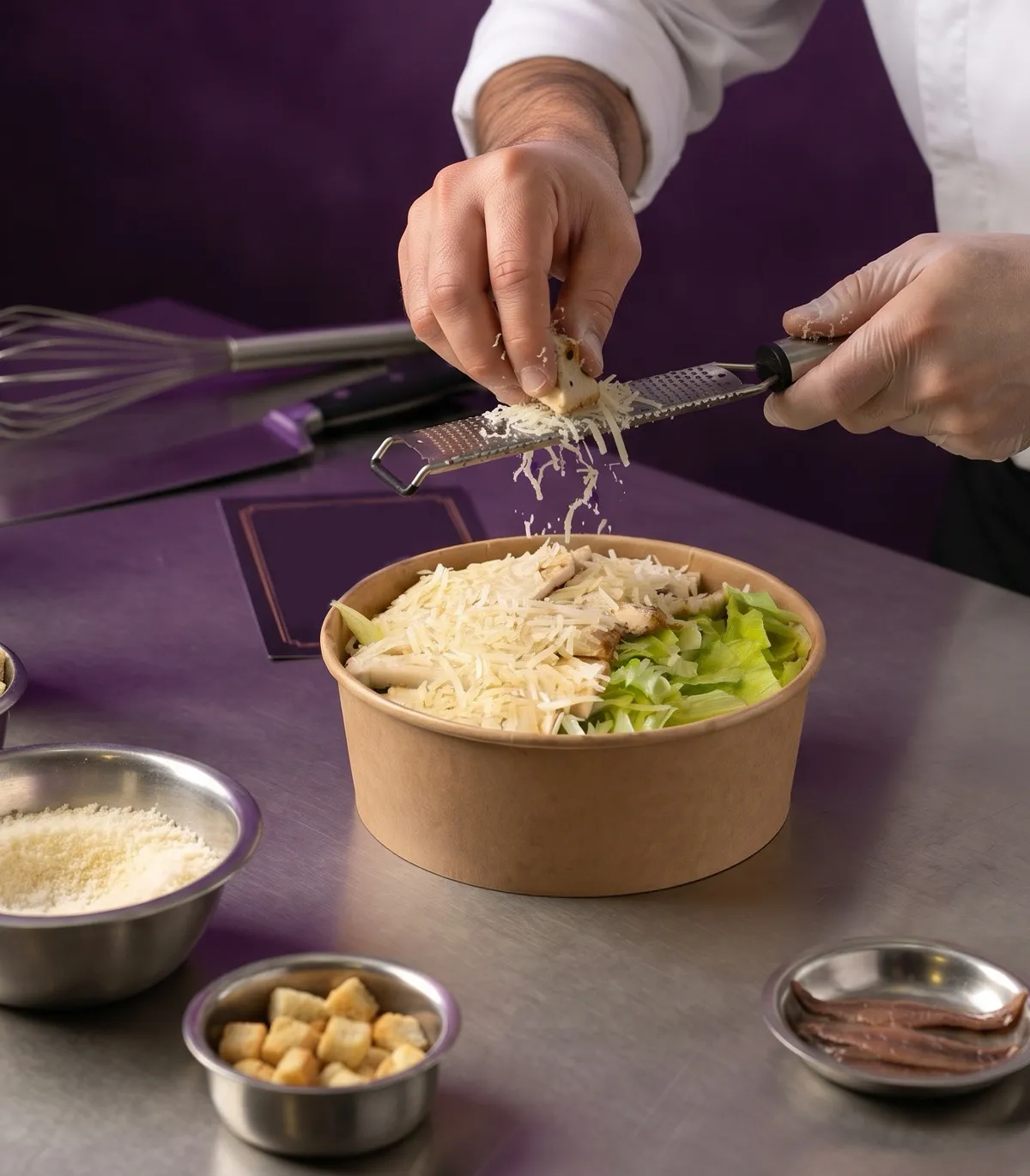 Chef plating a fresh, healthy dish